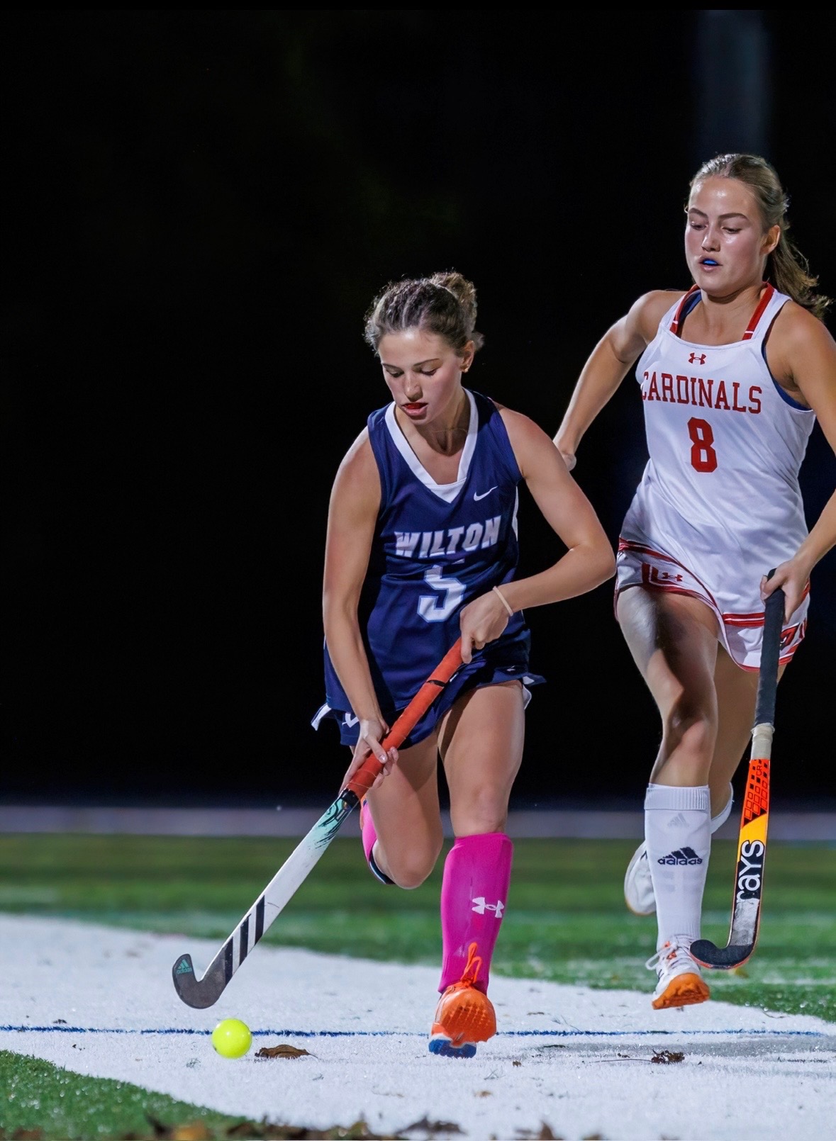 Maeve Ryder playing field hockey